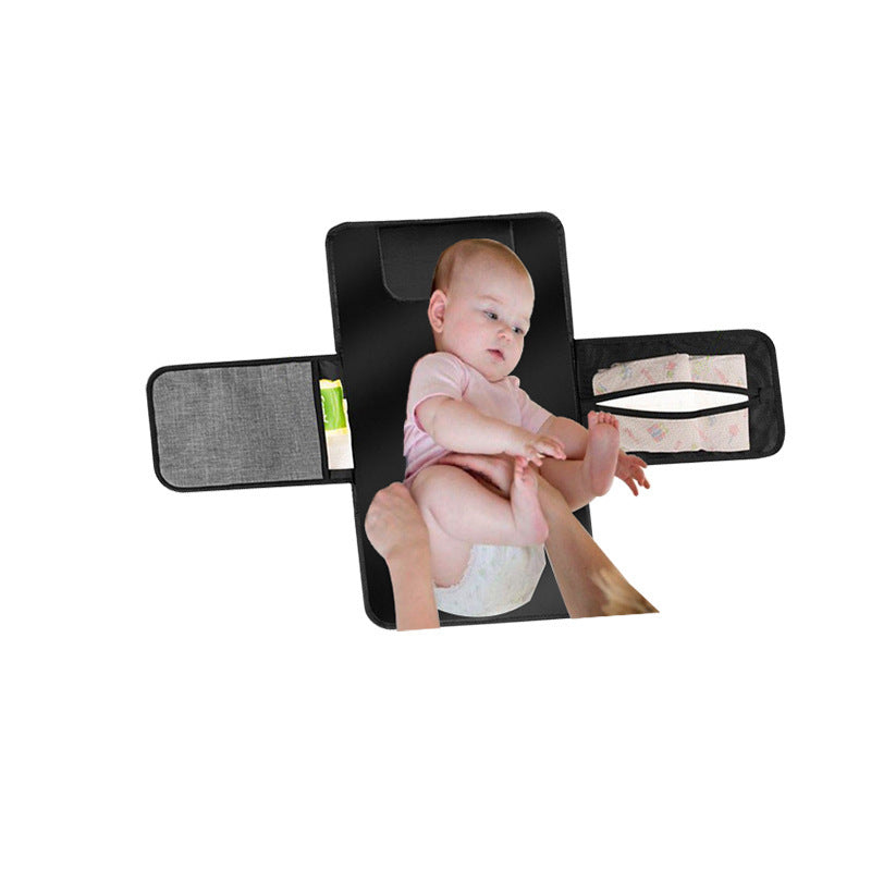 Protect your baby on the go with this foldable, waterproof changing mat—clean, compact, washable, and versatile as a play mat.